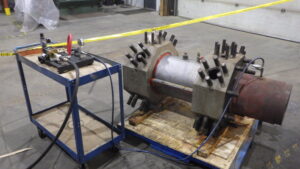 Compressor cylinder hydro testing for quality assurance